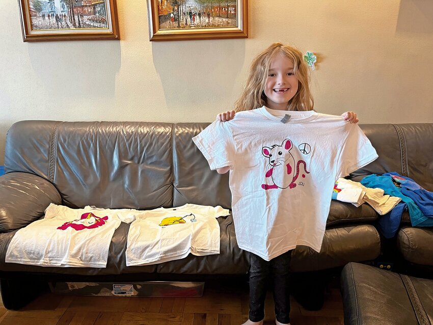 Amelia Rose Hassler is 6 years old and designing T-shirts she sells online with her mother. All the designs are Amelia&rsquo;s, as is the painting.