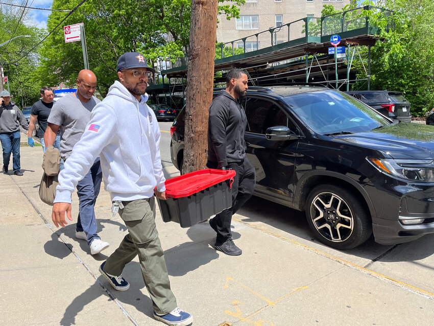 Federal law enforcement officials were seen carrying out boxes and bags from an apartment at 536 Kappock St., on Wednesday, where they said they found a narcotics distribution operation. Two people were arrested.