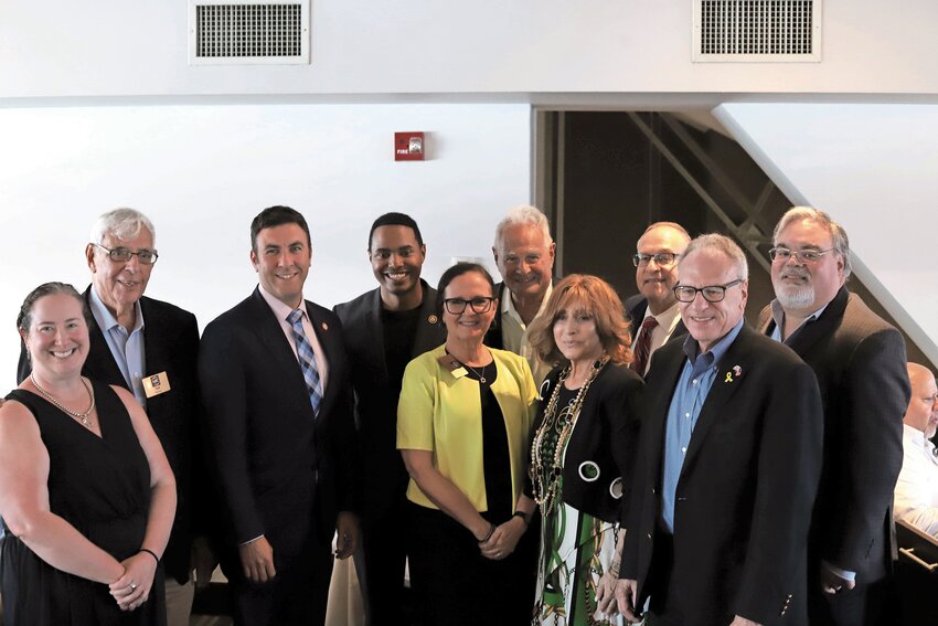 The full board of the Association of Riverdale Cooperatives and Condominium poses alongside their honoree, Assemblyman Jeffrey Dinowitz, U.S. Rep. Ritchie Torres and City Councilman Eric Dinowitz.