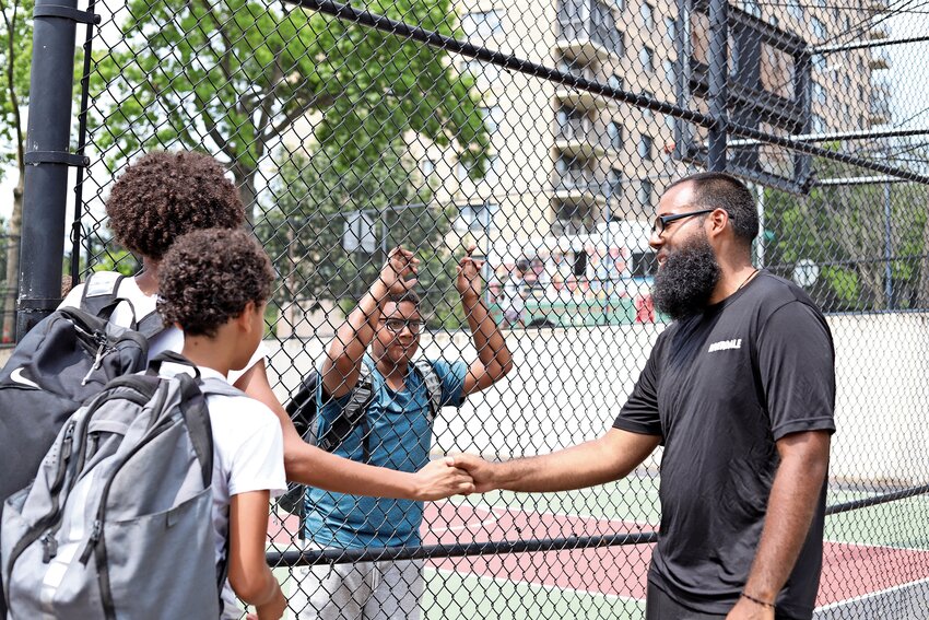 Jhoan De Jesus, right, can be found on the Spuyten Duyvil basketball courts nearly every day, leading players through drills and scrimmages.