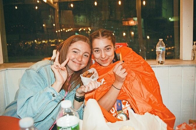 Kutler (r) participated in her first-ever marathon in 2023 is pictured with her friend Haley Carson and said a long run is worth it because she can enjoy a cheeseburger afterwards.