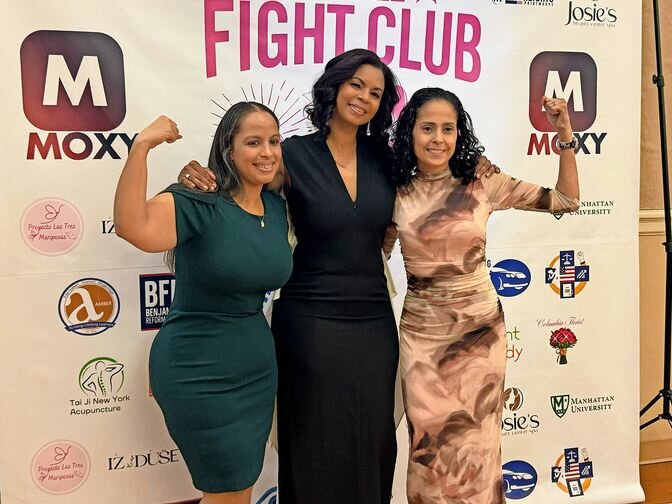 More than 100 women joined Joanna Edmondson (center) at the International Women's Day gala held at Manhattan University on Saturday, March 8.