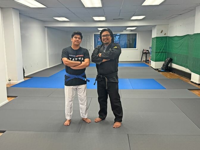 One of Master Ronald Caaya&rsquo;s instructors, Renz Santos (l), also still trains with Caaya.