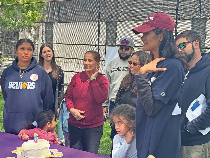 Jessica Woolford, right, started Kingsbridge Unidos in 2020. She fought back tears as she thanked the crowd for its support over the last five years.