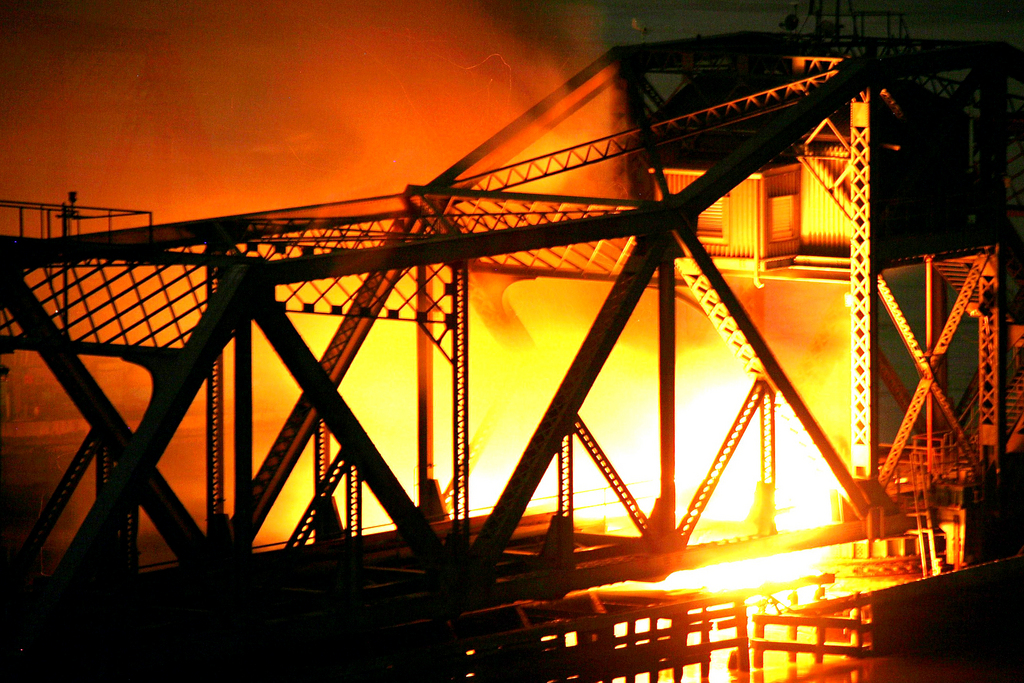 A blaze engulfs the Spuyten Duyvil railroad bridge at approximately 2:30 a.m. on Oct. 24.