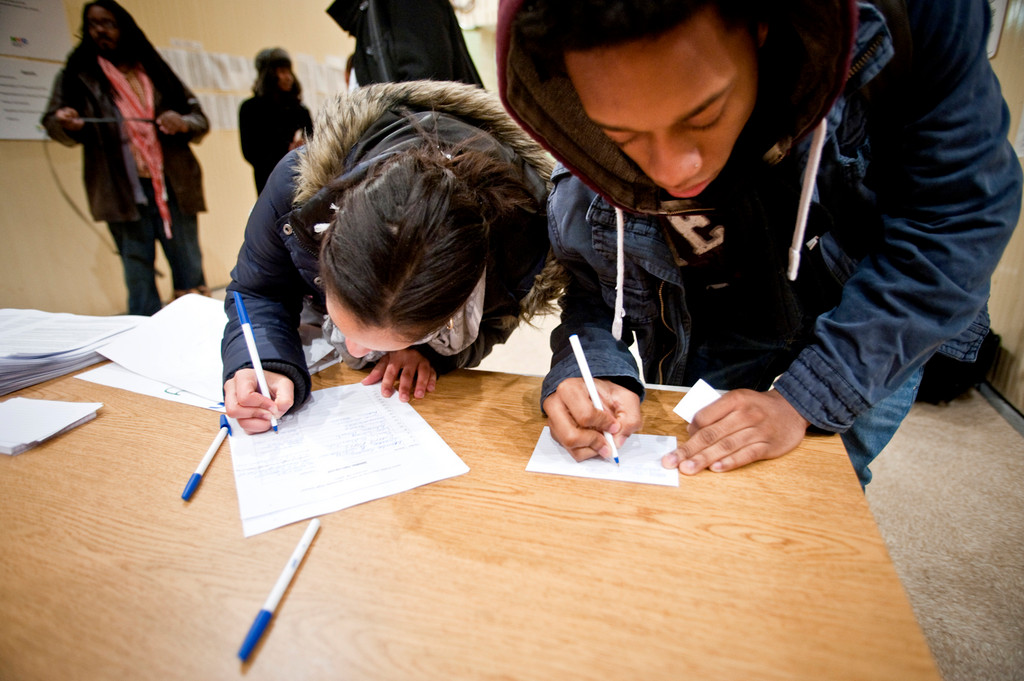 Students sign up to speak.
