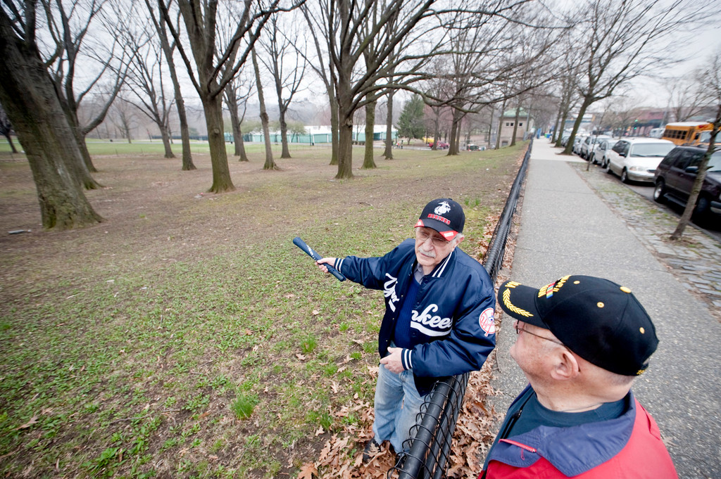 Veterans Herb Barret, left, and Don Tannen visit memorial grove on Monday morning.
