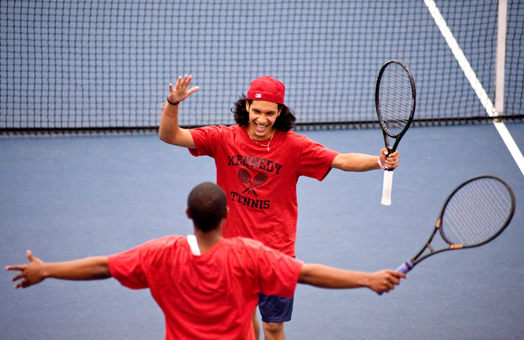 John F. Kennedy's Joseph Nuesi, far, and Kedarry Ransome celebrate as they clinch their first No. 1 doubles match during the Knights's 4-1 defeat of Eleanor Roosevelt High School in the PSAL B-division championships in Flushing, Queens on May 18.