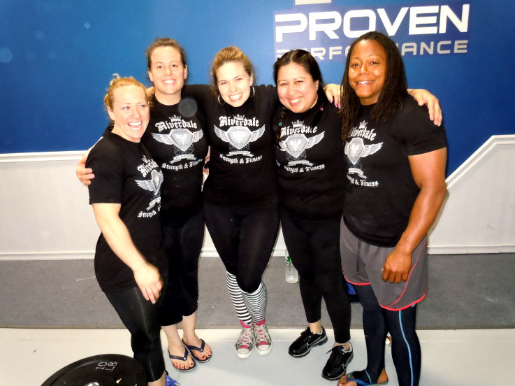 From left to right, Anita Neveu, Celestine Calpin, Alexandra Dantec, Maricela Campo and Phaidra Knight pose for a picture at the 'Proven Performance Strongman' competition in Northborough, Mass. on May 15. Neveu and Knight both won their respective weight classes.