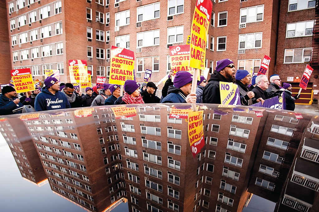 March 3, 2011 - Bronx, NY : Bronx apartment workers march down West 239th St. as they rally in Riverdale on March 3.