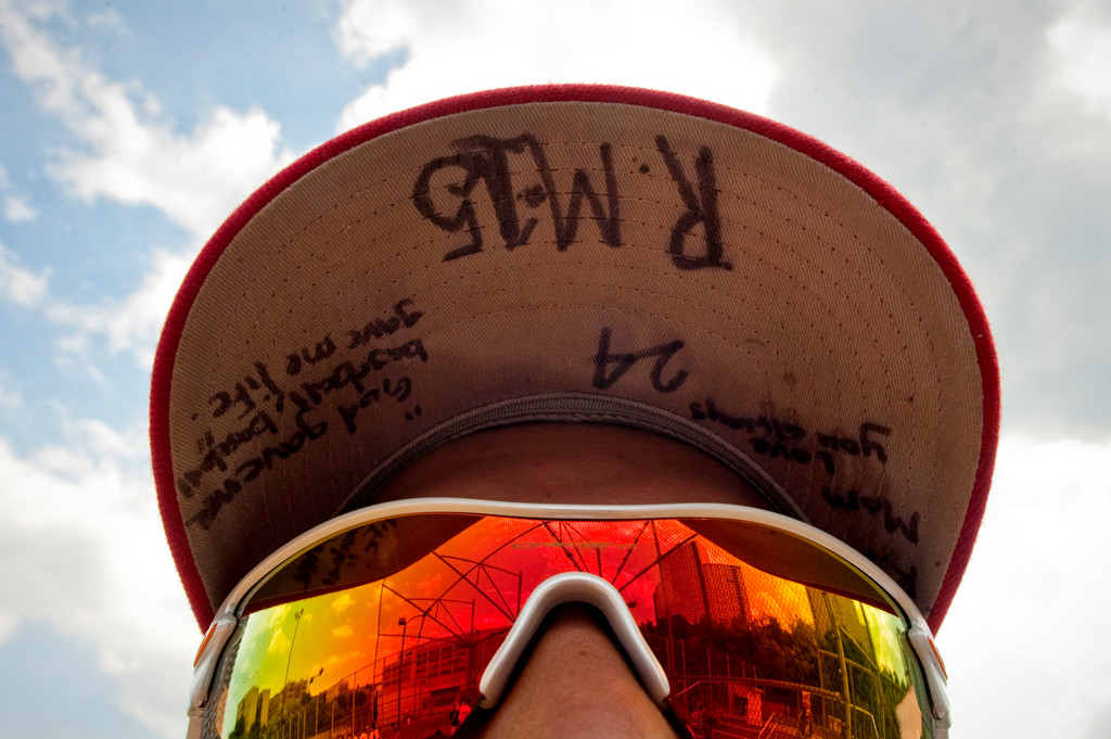 John F. Kennedy High School baseball player Pedro Taveras, photographed on May 25, wears a cap in
honor of his late mother that bears the inscription ‘Mom, Love you always’ and ‘God gave me baseball,
baseball gave me life.’