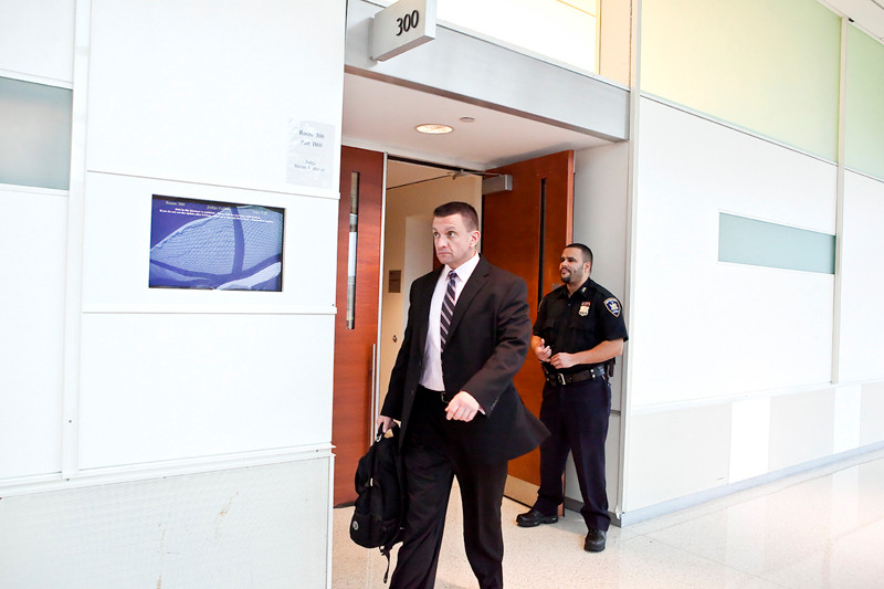 Kevin Spellman exits a Bronx courtroom on Oct. 19.