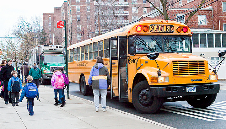 School Children get dropped off at Robert J. Christen, PS 81 on Tuesday, a day before drivers are scheduled to strike.
