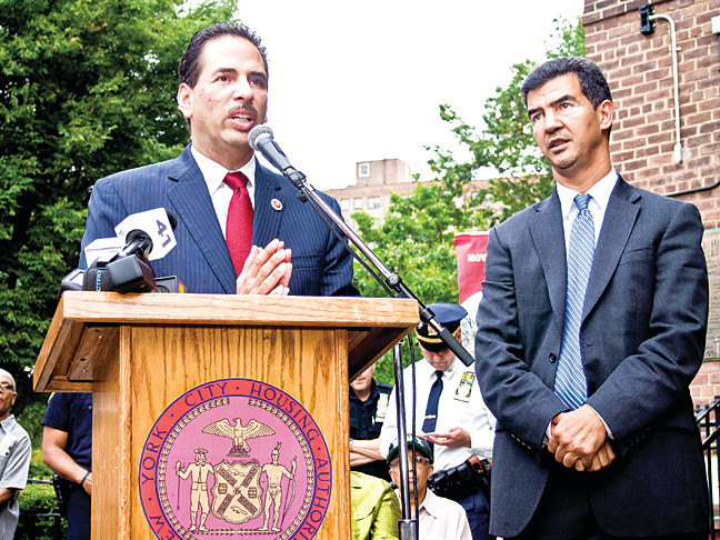 Councilmen Fernando Cabrera and Ydanis Rodriguez discuss the installation of security cameras at the Marble Hill Houses during a press conference on Oct. 3.