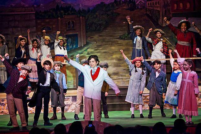 Thomas Grant, 11, as Professor Hill, takes center stage at the Riverdale Junior Rising Stars’ Jan. 12 production of ‘The Music Man Jr.’ at the Riverdale YM-YWHA.