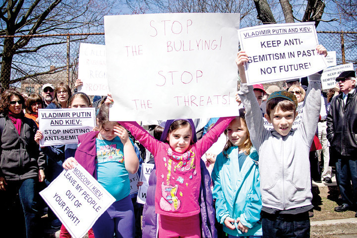 Batia Rabin, 11, Gabrielle Weingard, 8,  Hattie Simon 8, Laila Goldstein-Rosenfeld, 8, and Modi Goldstein-Rosenfeld participate in the demonstration.