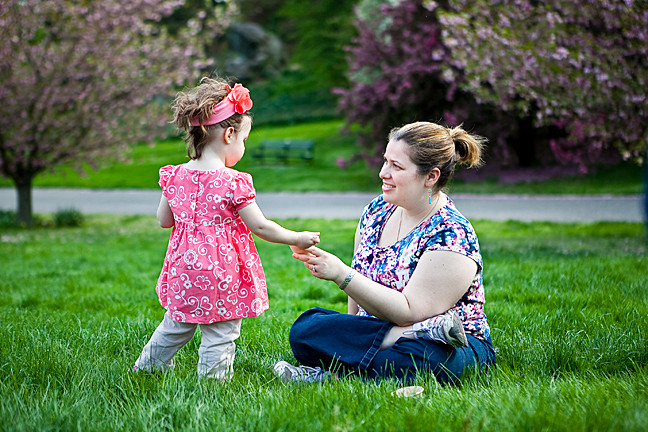 Jean Mary Bongiorno, 38, feeds ice cream to her daughter Grace Horne, 2, on Daffodil Hill at The New York Botanical Gardens as part of the Mother’s Day Weekend Garden Party on Saturday.