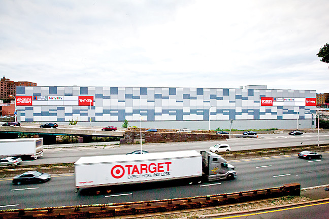Photo editor Marisol Díaz captured the moment as a Target truck sped along the Maj. Deegan Expressway past the new Broadway Plaza mall last Friday evening.
