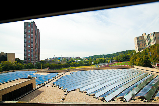 An array of photovoltaic panels on John F. Kennedy Educational Campus’ rooftop is expected to provide 5 percent of the building’s electricity.
