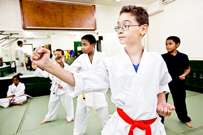 Carlos Navedo, 9, holds the “tetsui utchi” form.