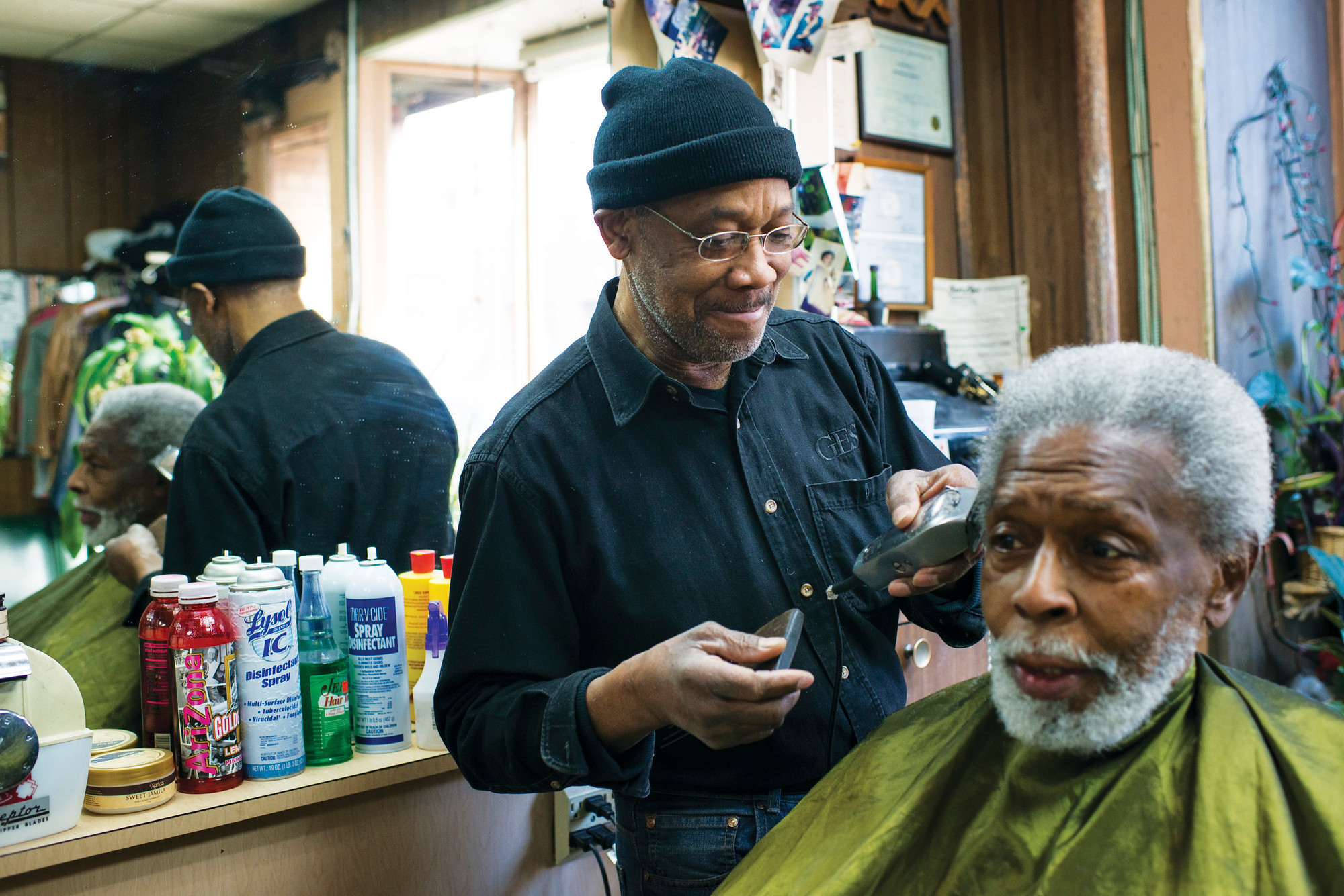Roosevelt "Rosey" Spivey, 75, cuts hair at his 53-year-old barbershop, the Marble Hill International Unisex Salon, on Jan. 15, 2015.
