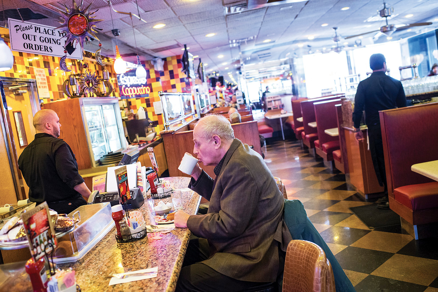 Attorney Lawrence Cooper has lunch at Riverdale Diner on Jan. 29.