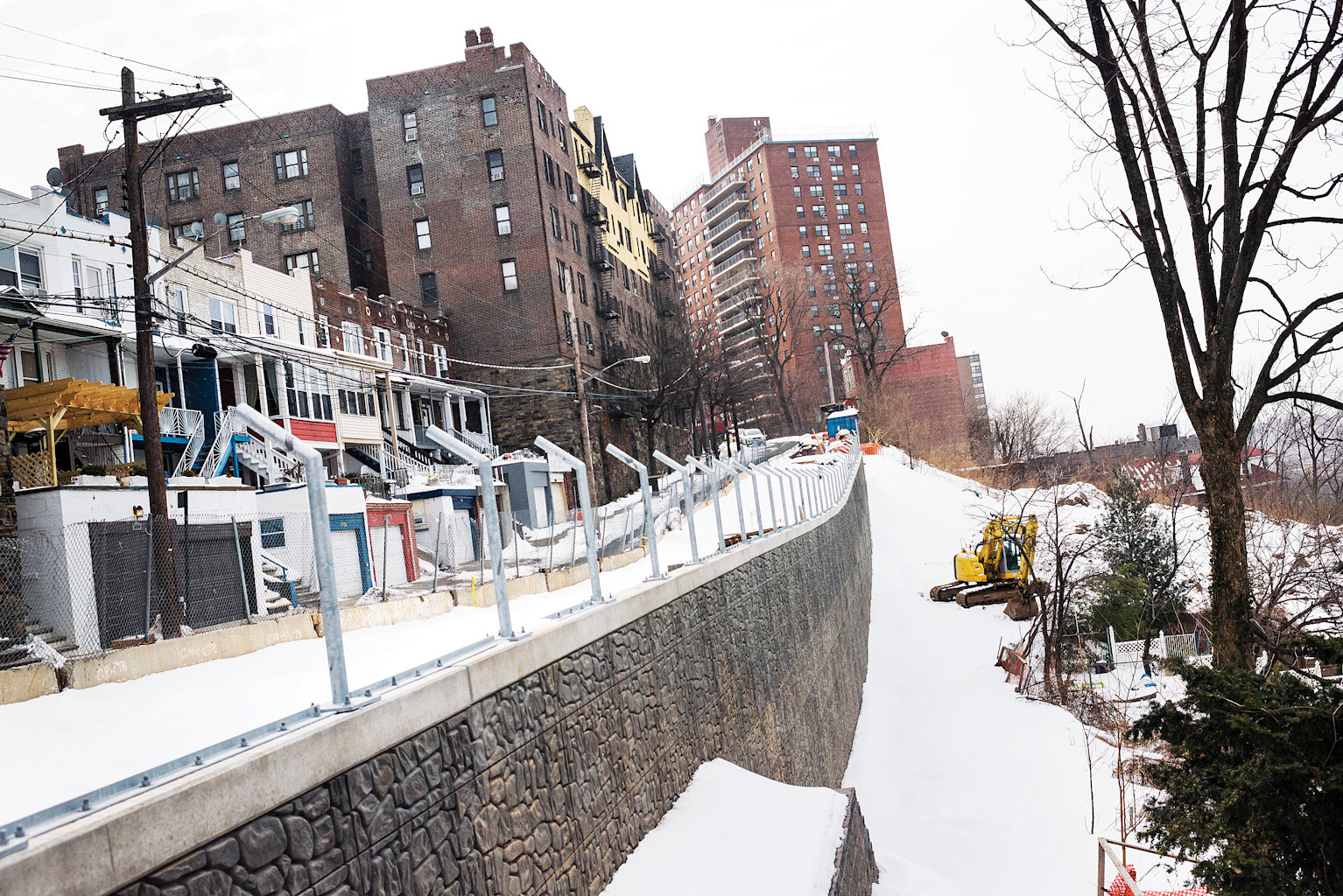 A retaining wall under construction on Cannon Place in Kingsbridge Heights on Feb. 27.
