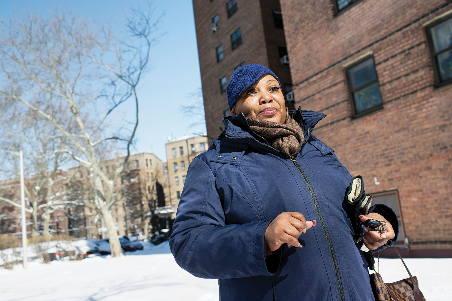 Rolanda Willis, 43, speaks to reporters on March 6 about the security camera system installed last year in NYCHA's Marble Hill Houses.