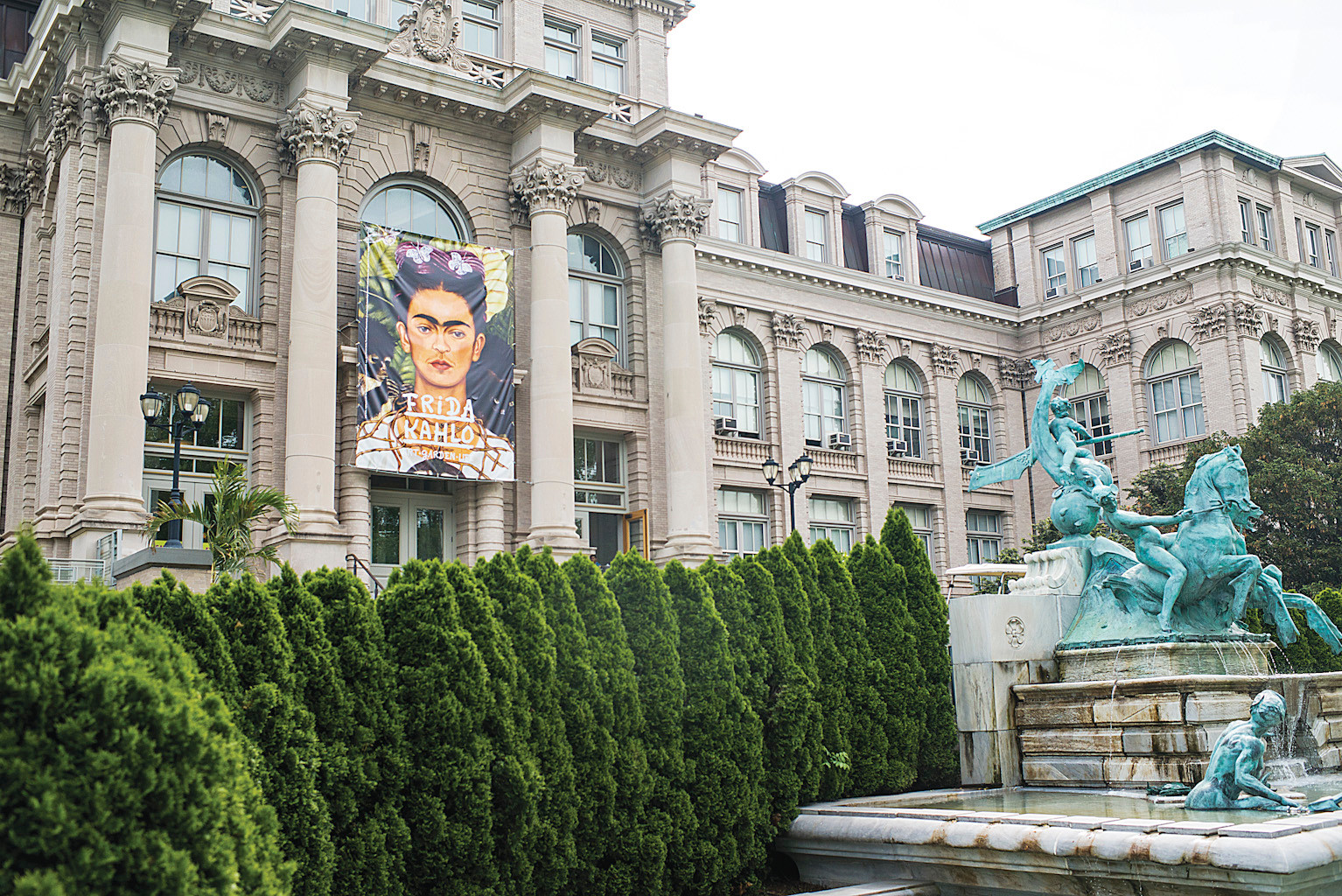 A large Frida Kahlo print hangs from the Britton Rotunda entrance.