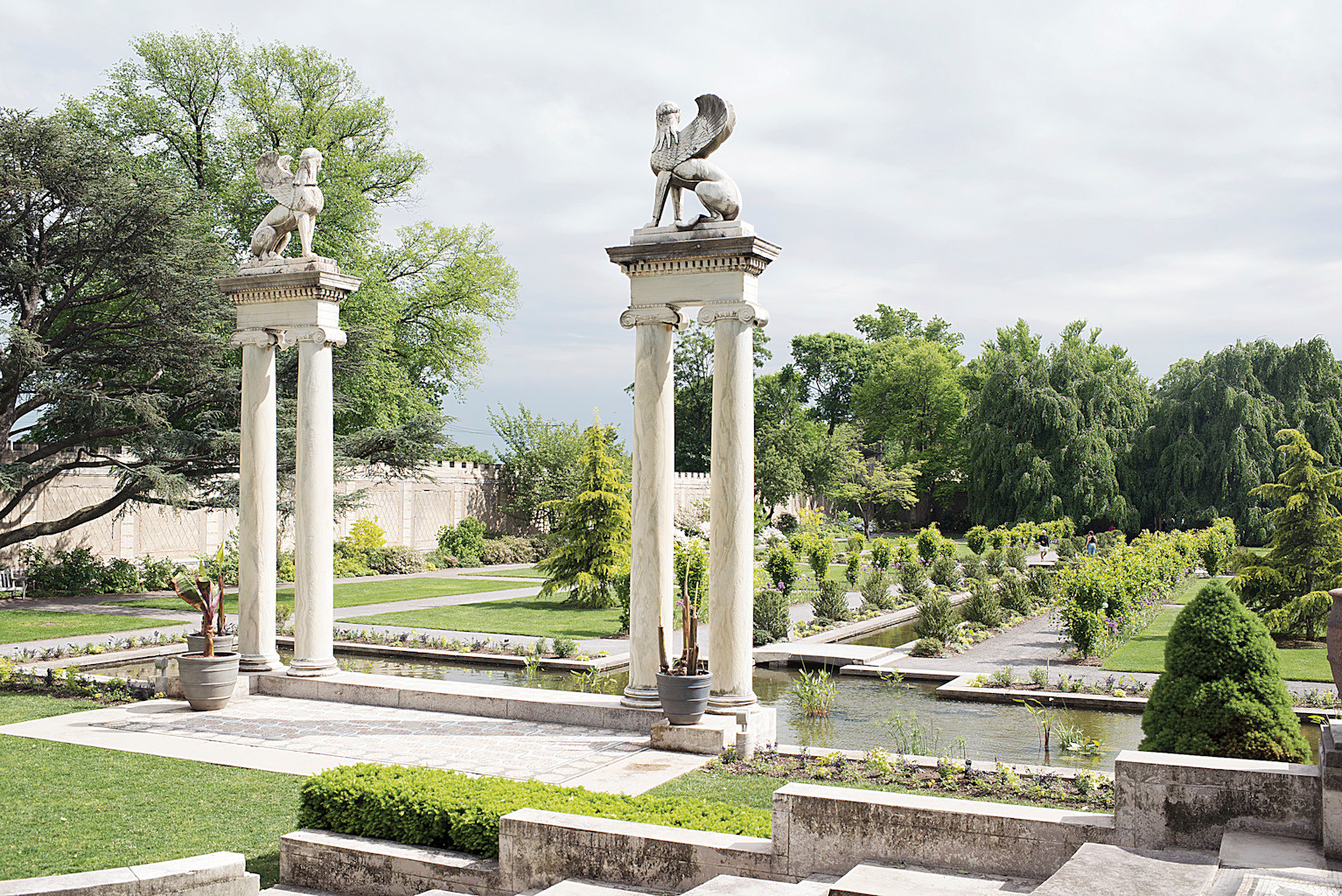 Greco-Roman columns overlook the reflecting pools in the Walled Gardens at Untermyer Park.