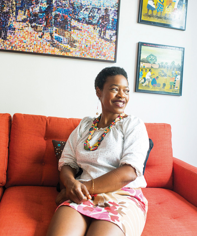 Chiseche Mibenge, 40, a local BRIO award winner, sits for a portrait in her home in South Riverdale on June 26.