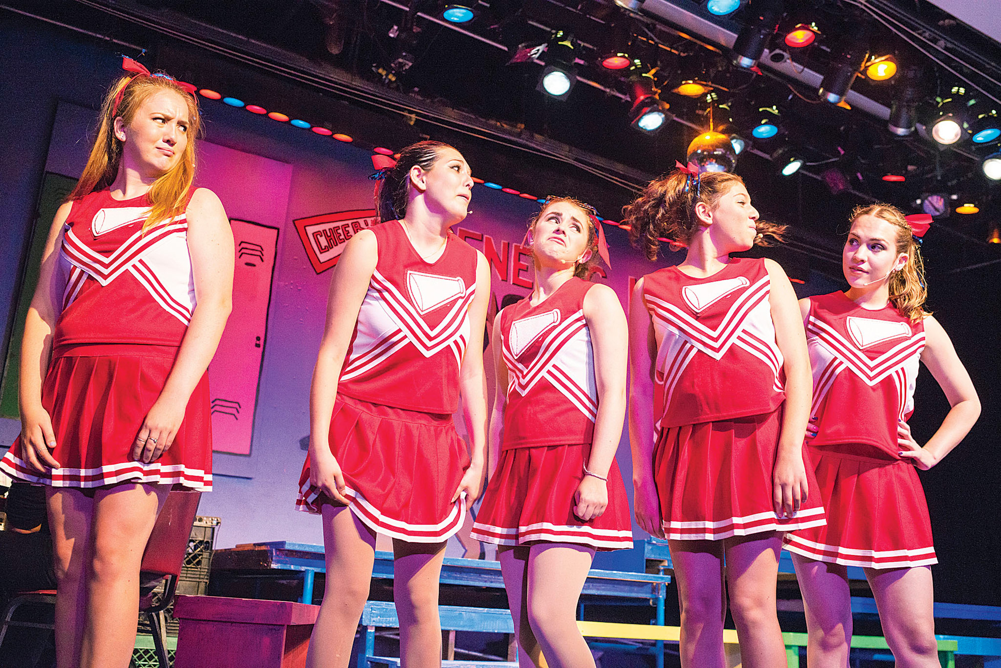 The high school cheerleading squad, led by Jessica Lavery, age 21, right, in "Can You Dig It? A 70s Love Story," by the Riverdale Rising Stars.