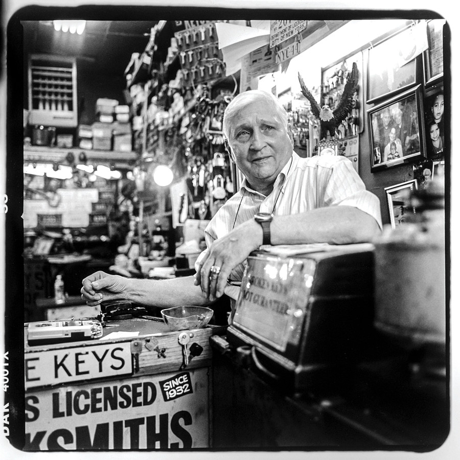 Bronx Photo League/Bronx Documentary Center

Images from Jerome Ave Workers Project.  

Raymond Herskovits inside of his miniature storefront, Mel's Locksmiths at 4 East 170th Street. Raymond is a third generation locksmith; his grandfather first opened the shop in 1932. He no longer resides in the Bronx, but commutes six days a week from his home in New Jersey to open his shop.