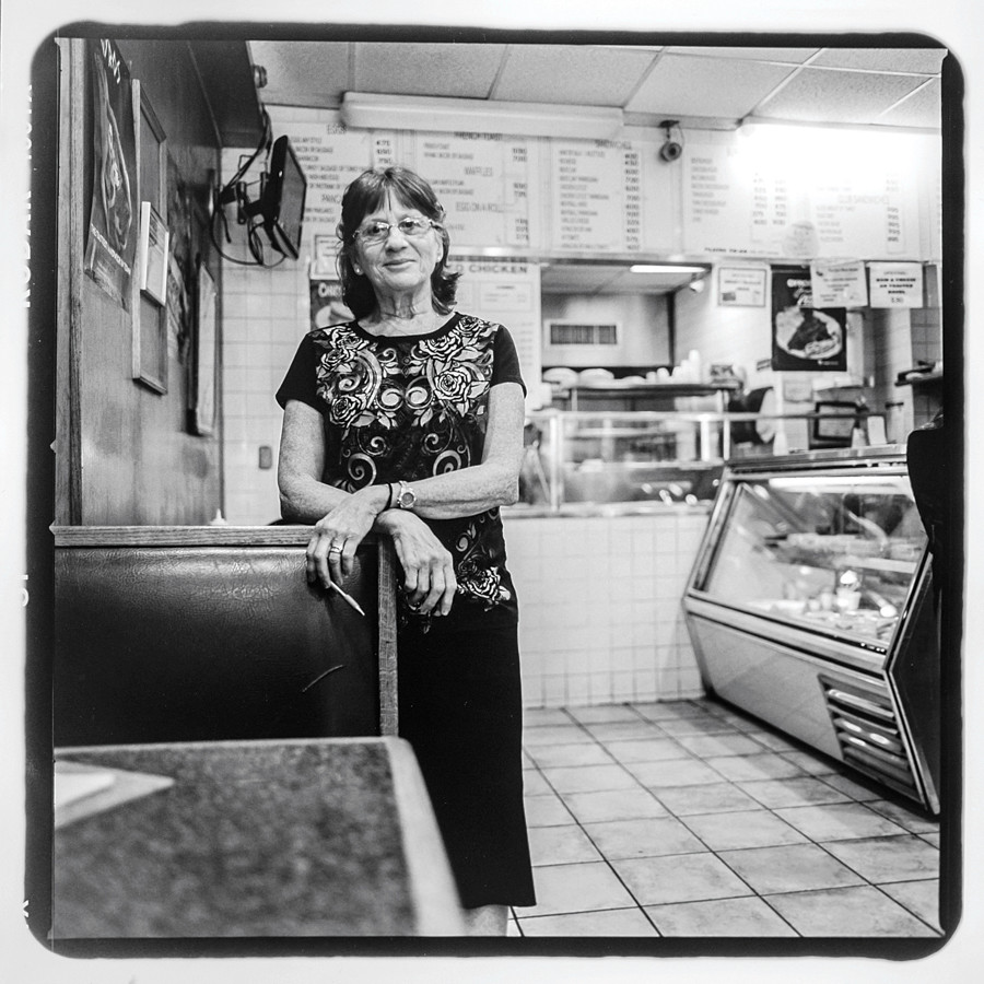 Tessie Polygerinos at Munchtime Diner on 170th St. between Jerome Ave & Townsend Ave. Her husband, Laki, has owned the diner since the 1960s. The diner has been serving Bronx residents for over 60 years.