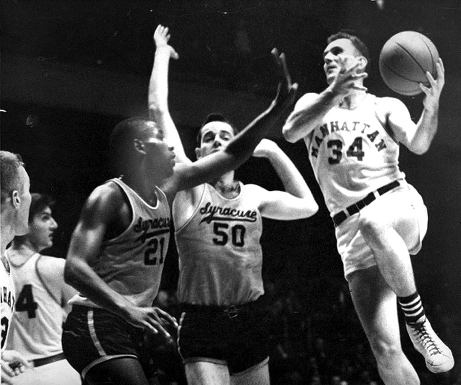 Former Manhattan College basketball player and coach Jack Powers, whose number #34 will soon be retired, in a game against Syracuse in the 1950s.