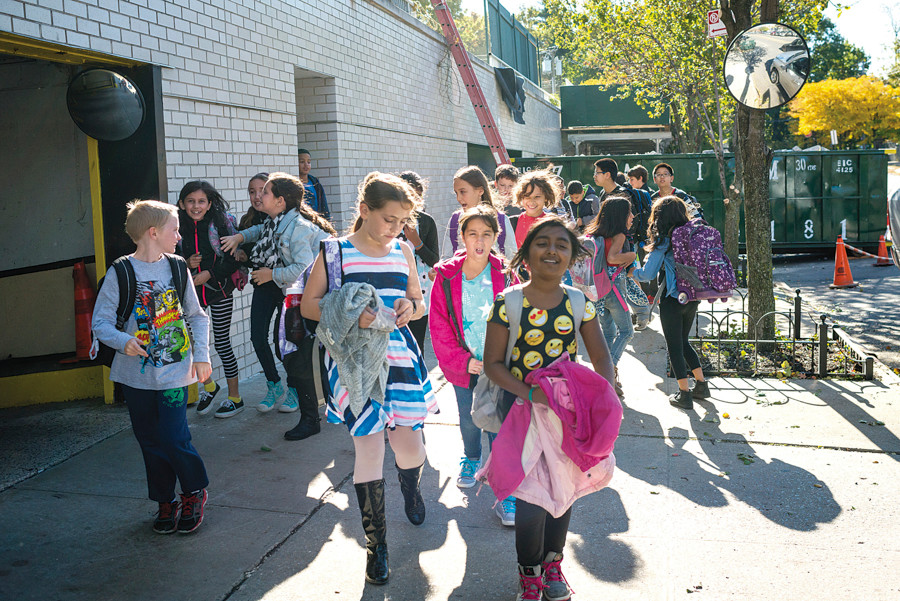 Fifth-grade students leave the Whitehall site rented for the Spuyten Duyvil School (P.S. 24) in October 2015