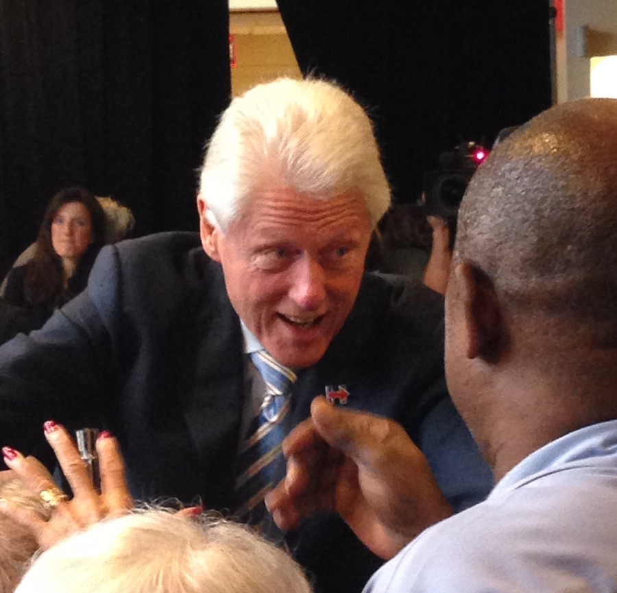 Former President Bill Clinton speaks with residents and staff at the Hebrew Home at Riverdale after delivering a speech supporting Hillary Clinton's presidential candidacy on Monday morning.