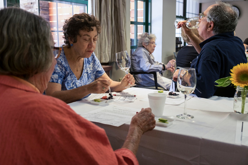 Photo by Jon Santiago. 6.24.16. Residents of the Atria Riverdale Assisted Living Center enjoy a wine and food pairing event.