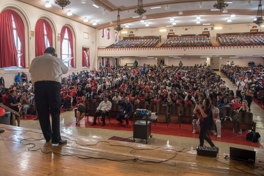 DeWitt Clinton's Principal Santiago 'Santi' Tavares addresses students in the auditorium during the "I Commit to Graduate" event at the high school on Friday, Sept. 23.