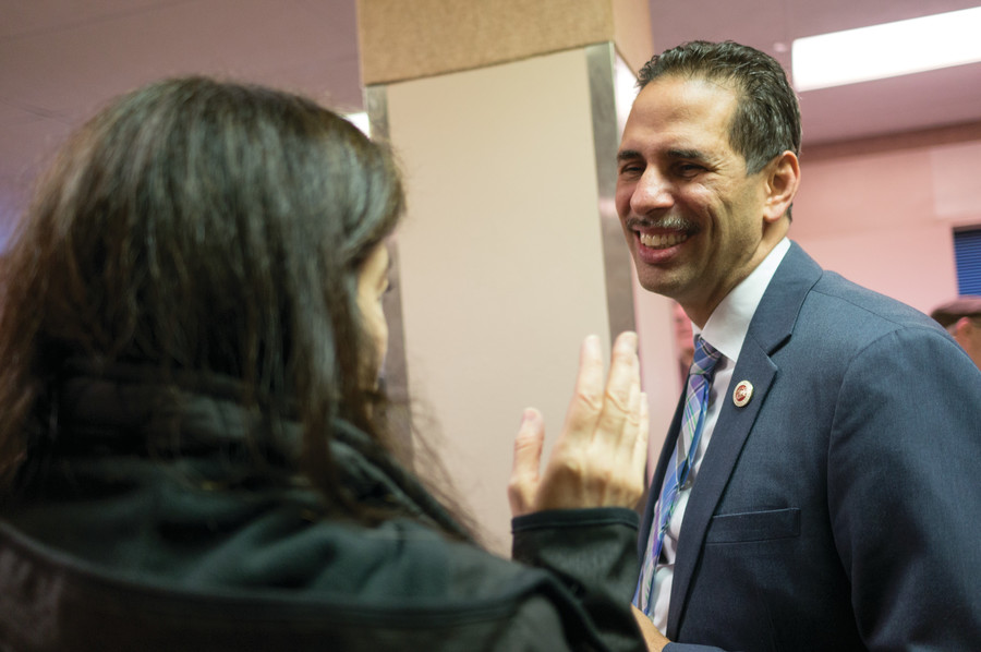 Fernando Cabrera talks with a member of the Ben Franklin Reform Democratic Club where he secured his Democratic primary endorsement for city council.
