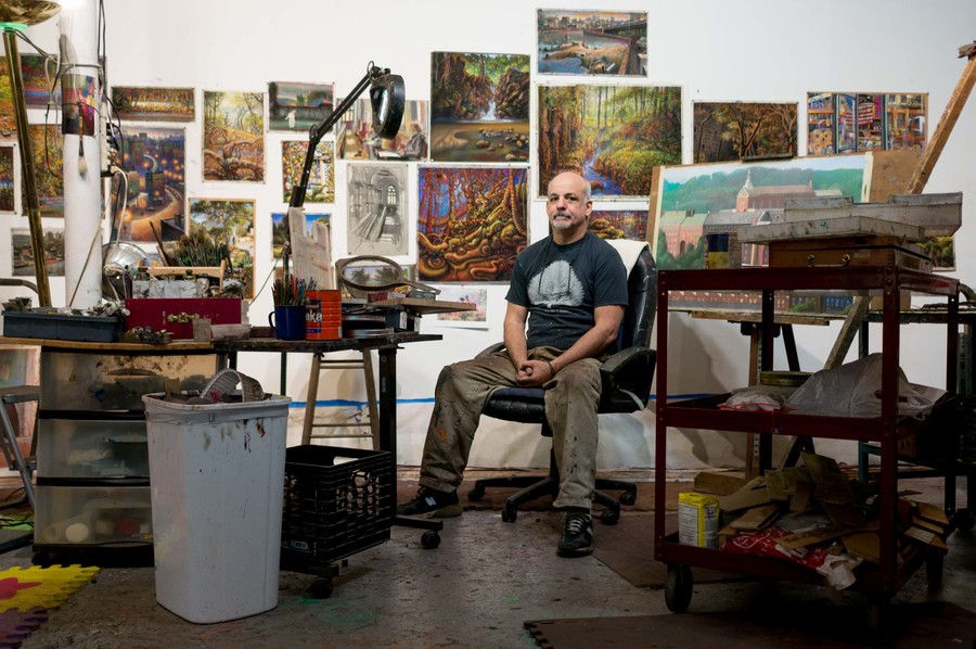 Daniel Hauben is surrounded by works in progress in the Riverdale studio where he is as likely to create a rural landscape as a gritty Bronx scene.