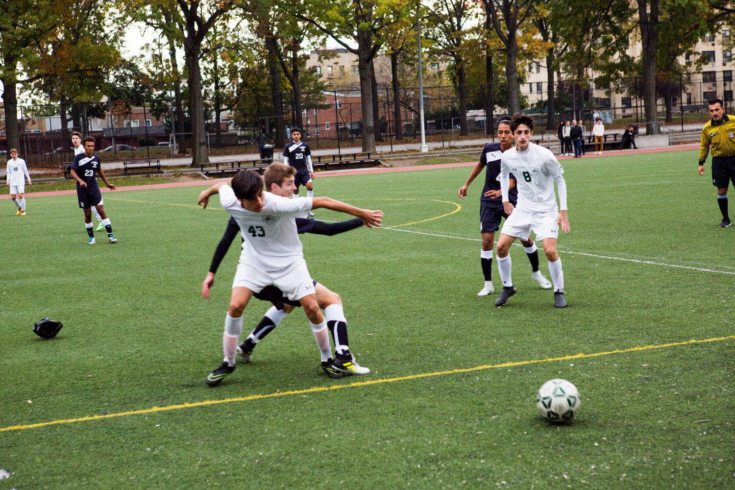 Bronx Science’s Mikael Young Malka (43) works around a Fort Hamilton defender in the Wolverines’ playoff loss last week.