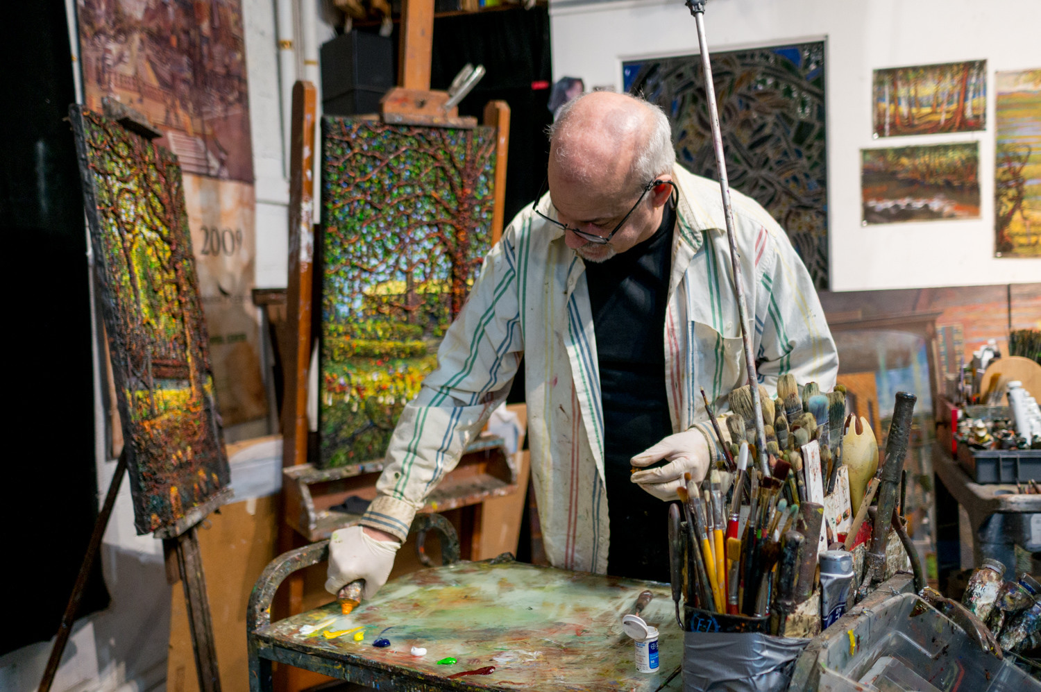 Daniel Hauben prepares his color palette in his Riverdale studio. Hauben is one of five artists featured in the exhibition 'Five Artists + Architecture' at City College of New York. He’s also been a professor there for 12 years.