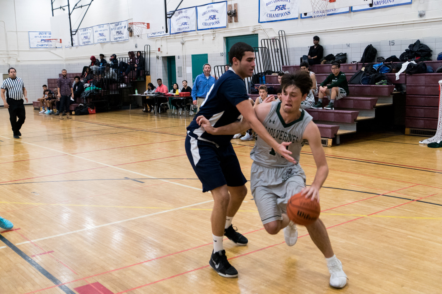Bronx Science forward Teddy Lowen works his way around a Walton defender during the Wolverines’ victory over division-rival Walton.