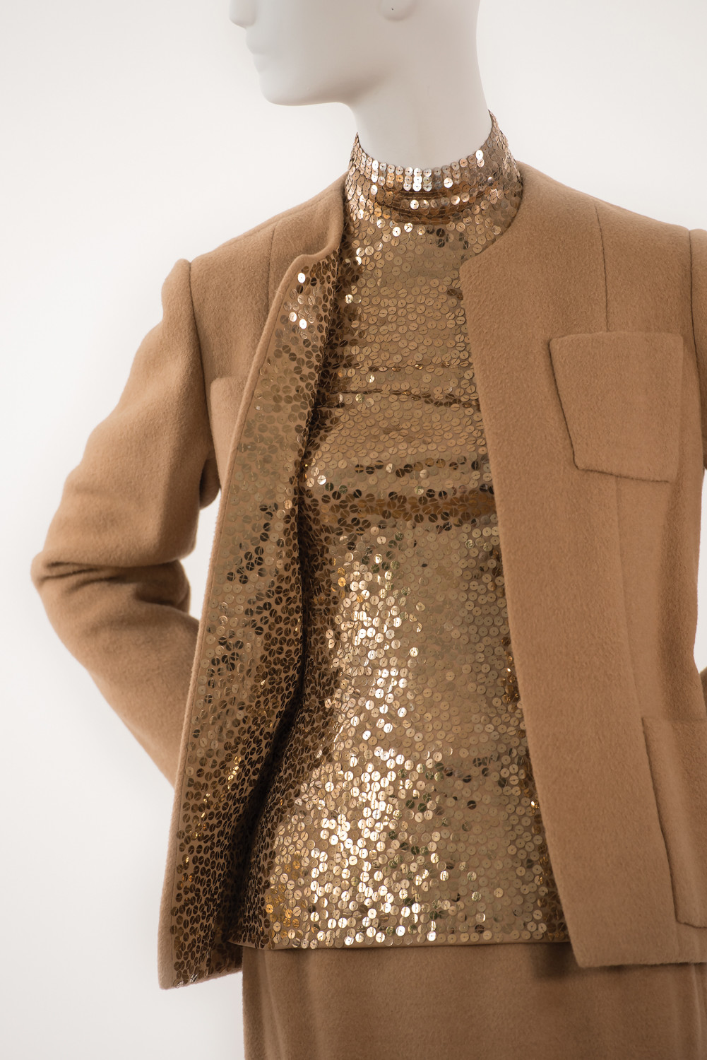 This 1971 camel hair and paillette theater suit is one of nearly 100 items featured at The Museum at Fashion Institute of Technology’s exhibition on fashion designer Norman Norell. Some of his clients included former first ladies Jacqueline Kennedy Onassis and Lady Bird Johnson. Michelle Obama wore a vintage dress by Norell during her time in the White House.