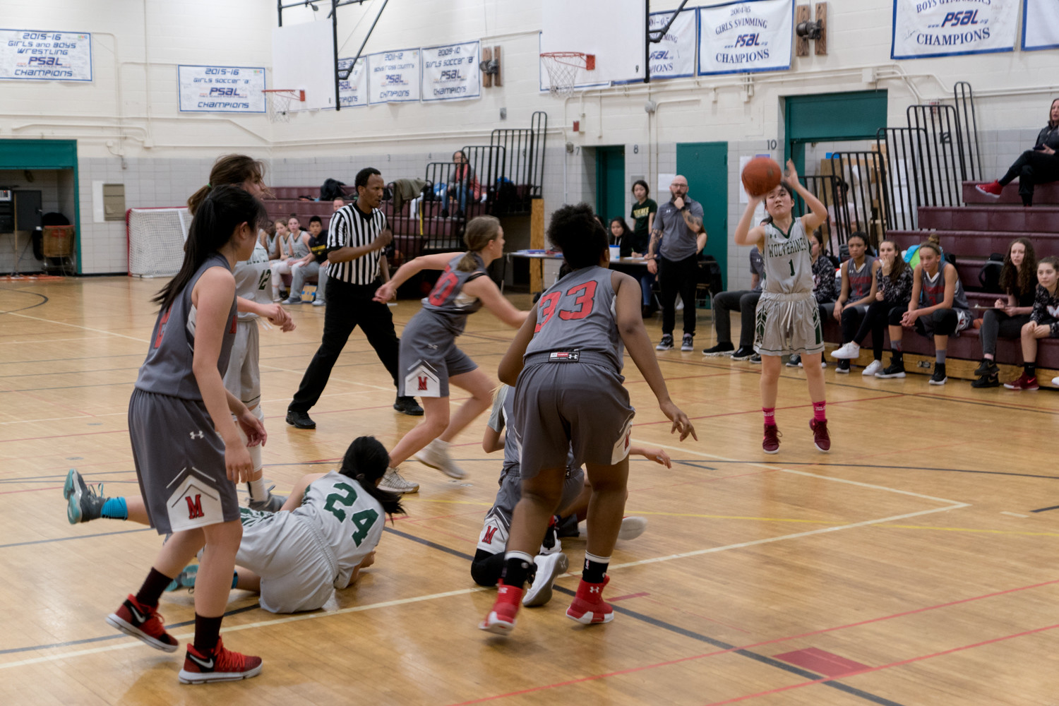 Senior guard Michelle Kim, who led Bronx Science with a game-high 15 points, gets ready to launch a three-pointer in the Wolverines’ PSAL playoff victory over Millennium.