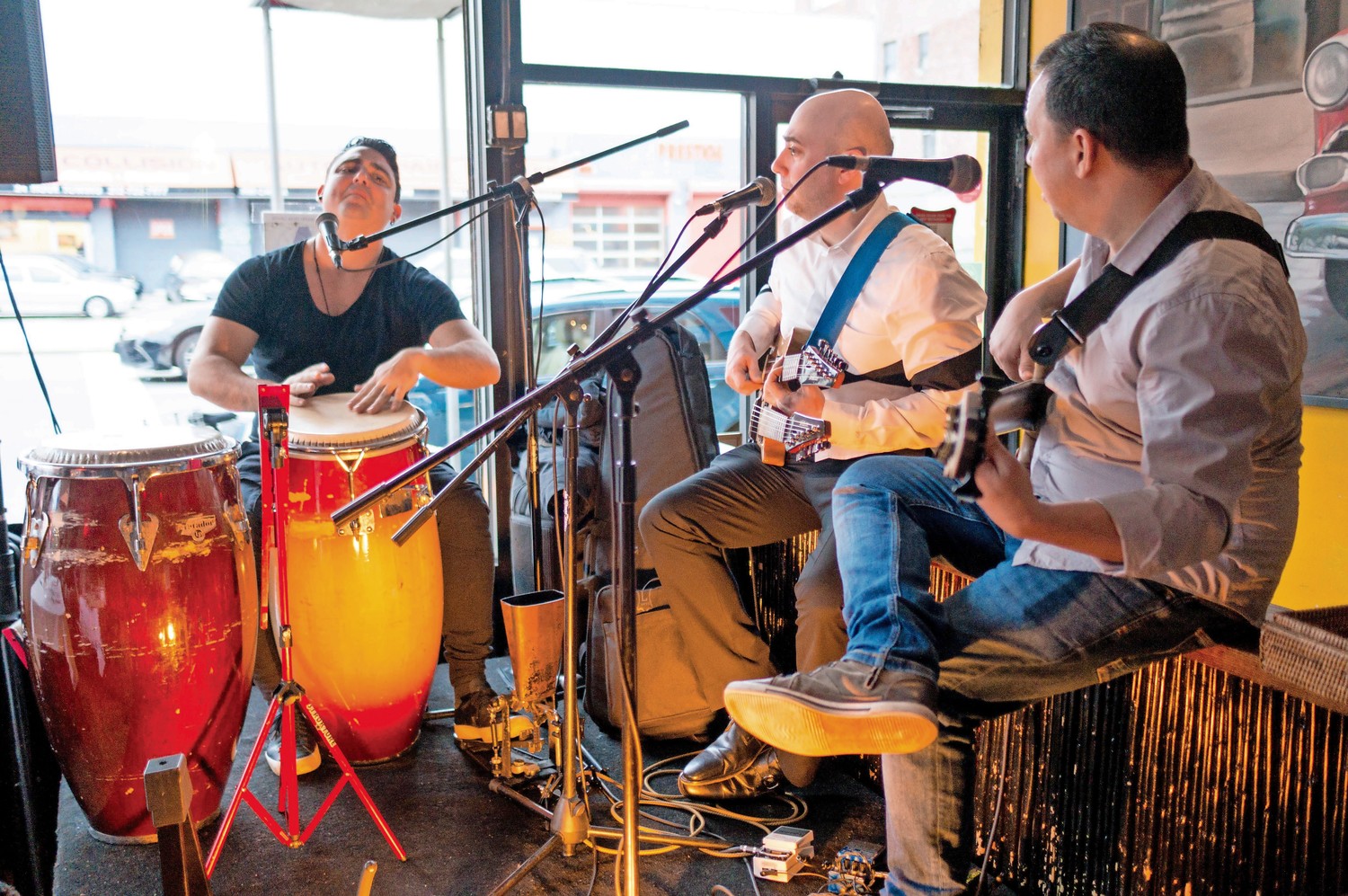 The musical group Trio La Cumbancha plays Cuban music at Amor Cubano, a Cuban restaurant in Harlem. A fundraiser was held for Lehman College students who are planning a weeklong trip to Cuba as part of their coursework.