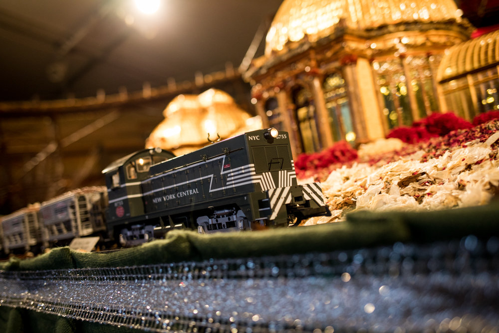 A model train passes in front of a replica of the Enid A. Haupt Conservatory at the New York Botanical Garden's Holiday Train Show, on display through Jan. 21.