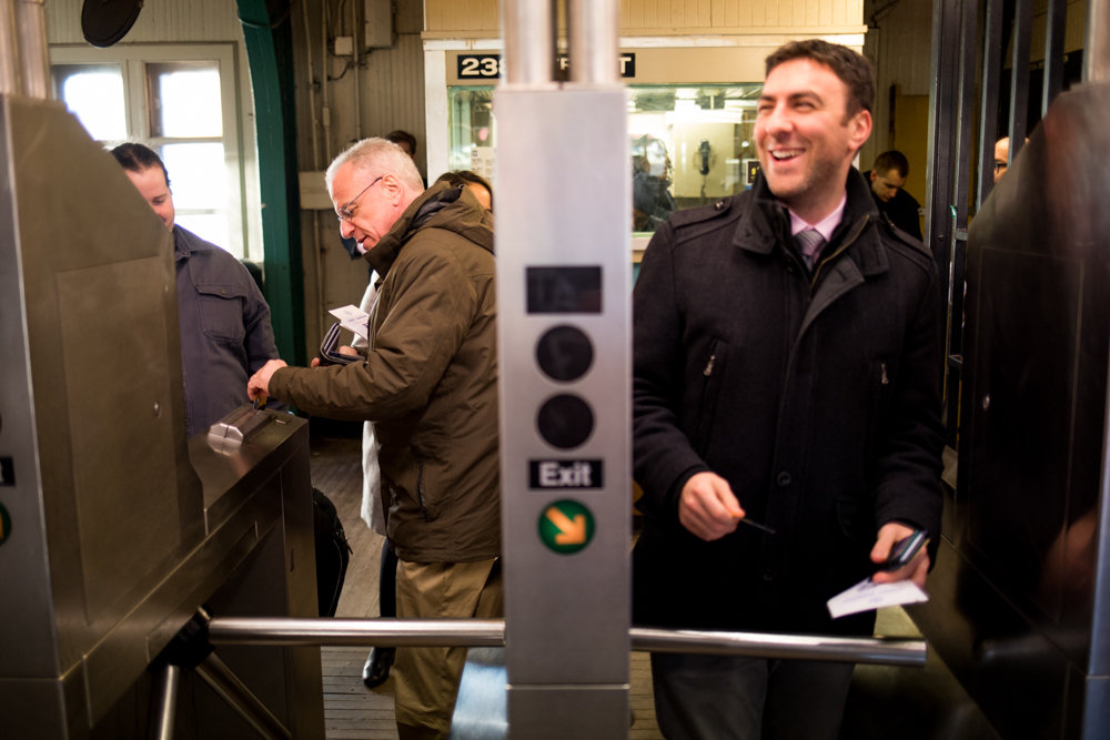 Assemblyman Jeffrey Dinowitz swipes his MetroCard at the West 238th Street 1 train station while his son — 81st Assembly Democratic district leader Eric Dinowitz — walks through the turnstile Jan. 11. The two were on hand to gather input from riders on how their commutes could improve during the final day of a week-long transit tour led by city council Speaker Corey Johnson, making stops in all five boroughs.