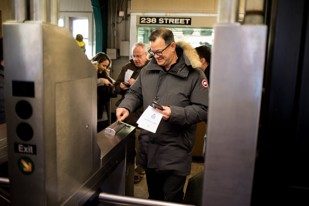 Councilman Andrew Cohen swipes his MetroCard to step onto the downtown 1 train platform at West 238th Street to conduct a transit tour with other local elected officials in order to better understand how commuters feel about the MTA.